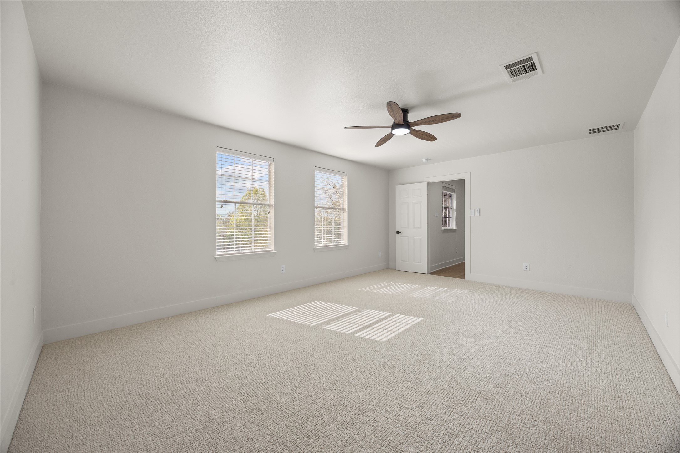 117 Waterloo Drive Kyle, TX 78640 - Photo 16 of 39 a view of an empty room with a window