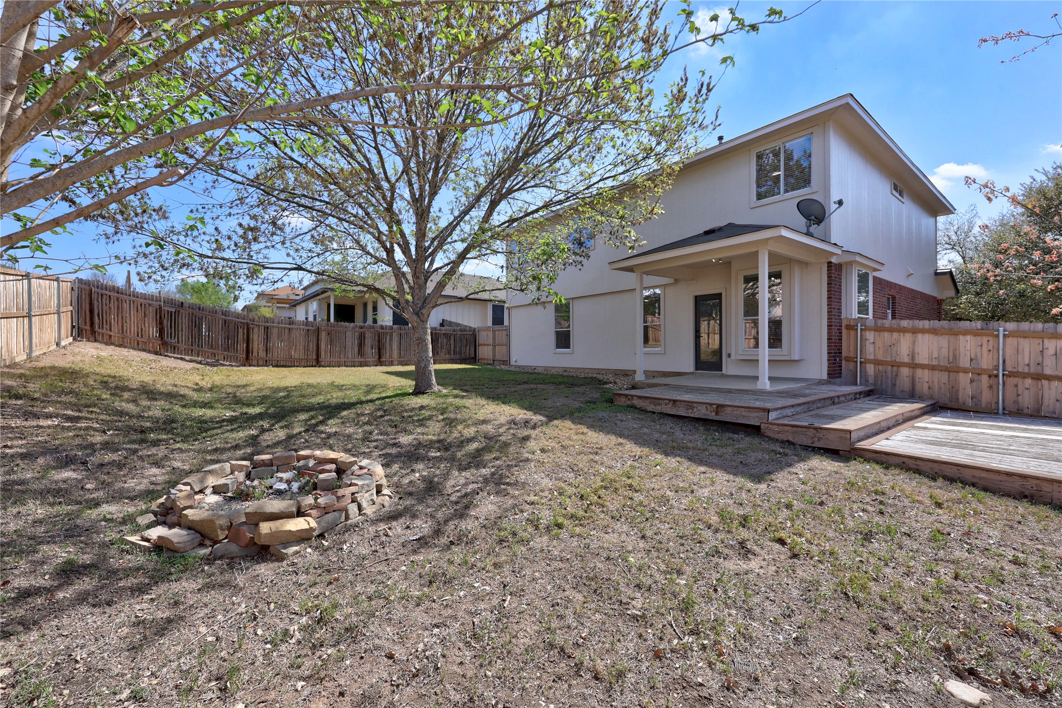 117 Waterloo Drive Kyle, TX 78640 - Photo 28 of 39 a front view of a house with a yard