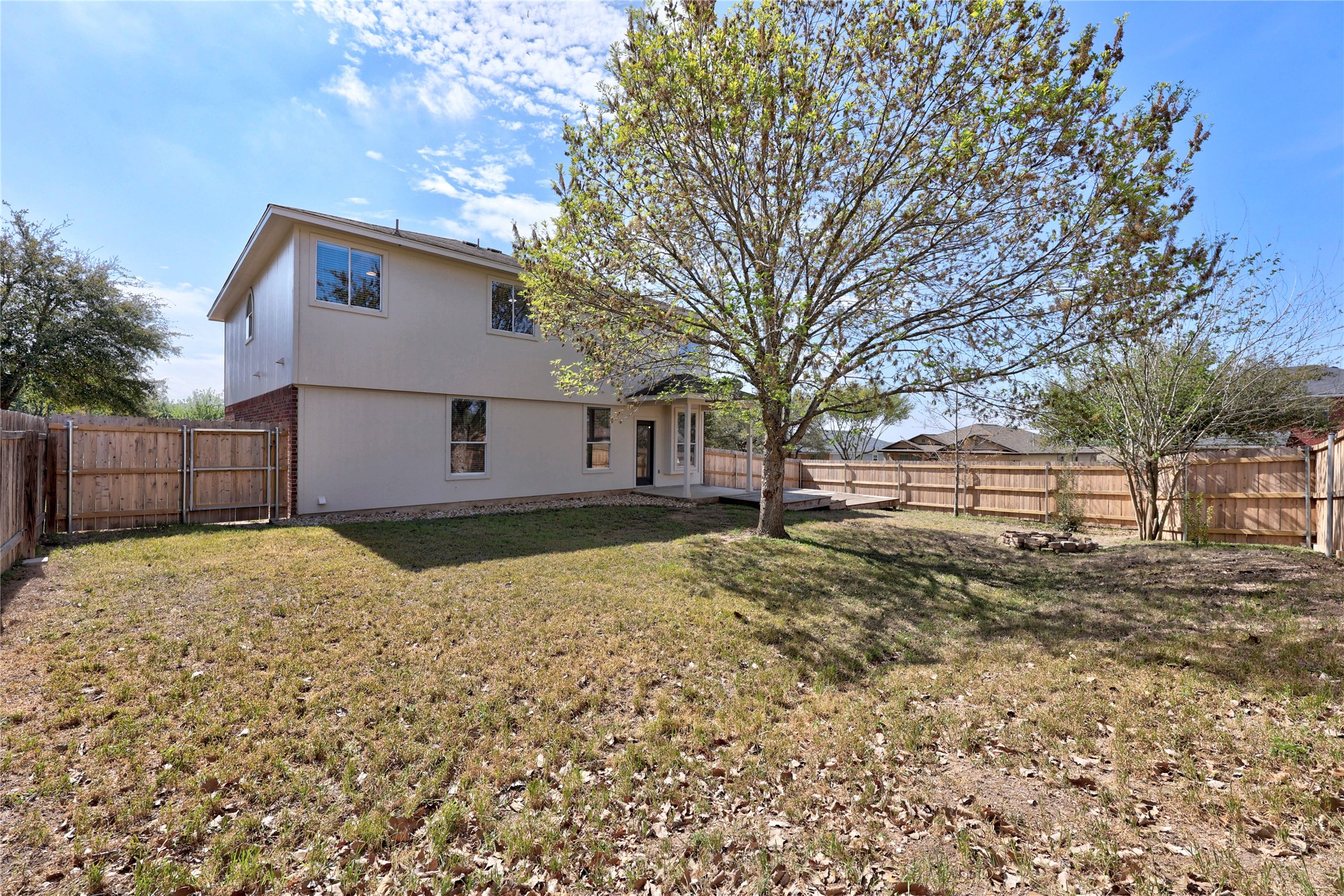 117 Waterloo Drive Kyle, TX 78640 - Photo 30 of 39 a view of a yard with a large tree