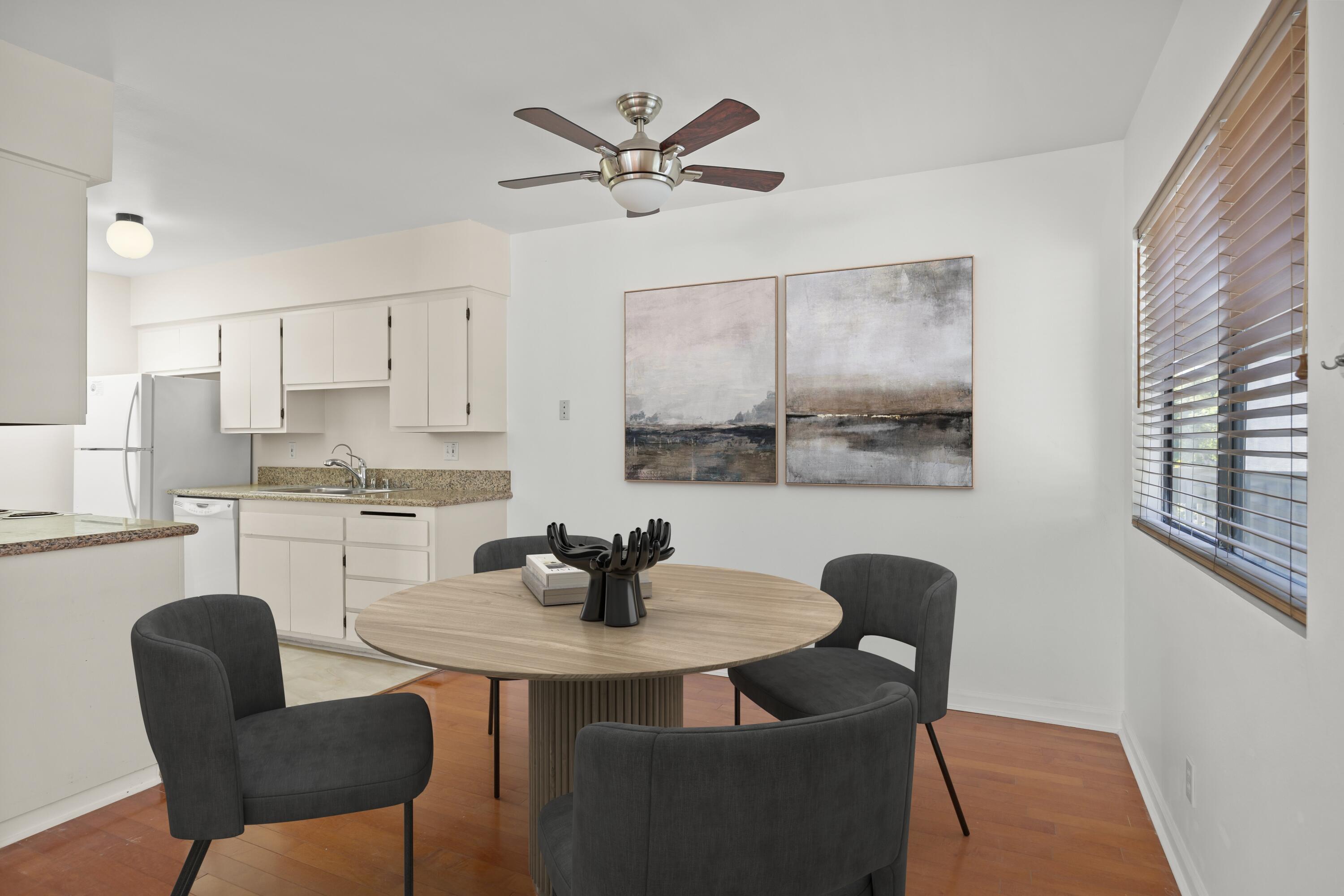 35 Dearborn Place, Unit 56 Goleta, CA 93117 - Photo 12 of 21 a kitchen with a dining table and chairs