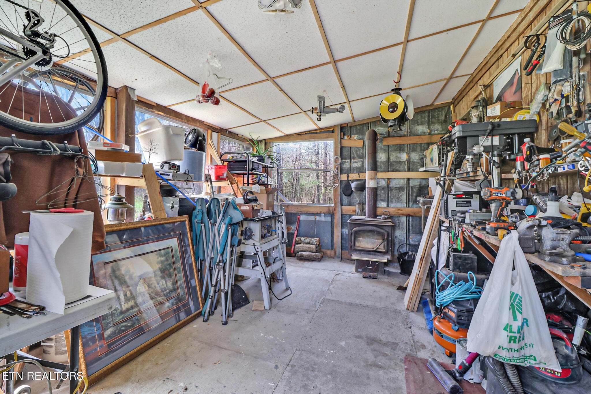 239 Doc Huling Road Robbins, TN 37852 - Photo 13 of 55 a view of a storage room with a lot of stuff