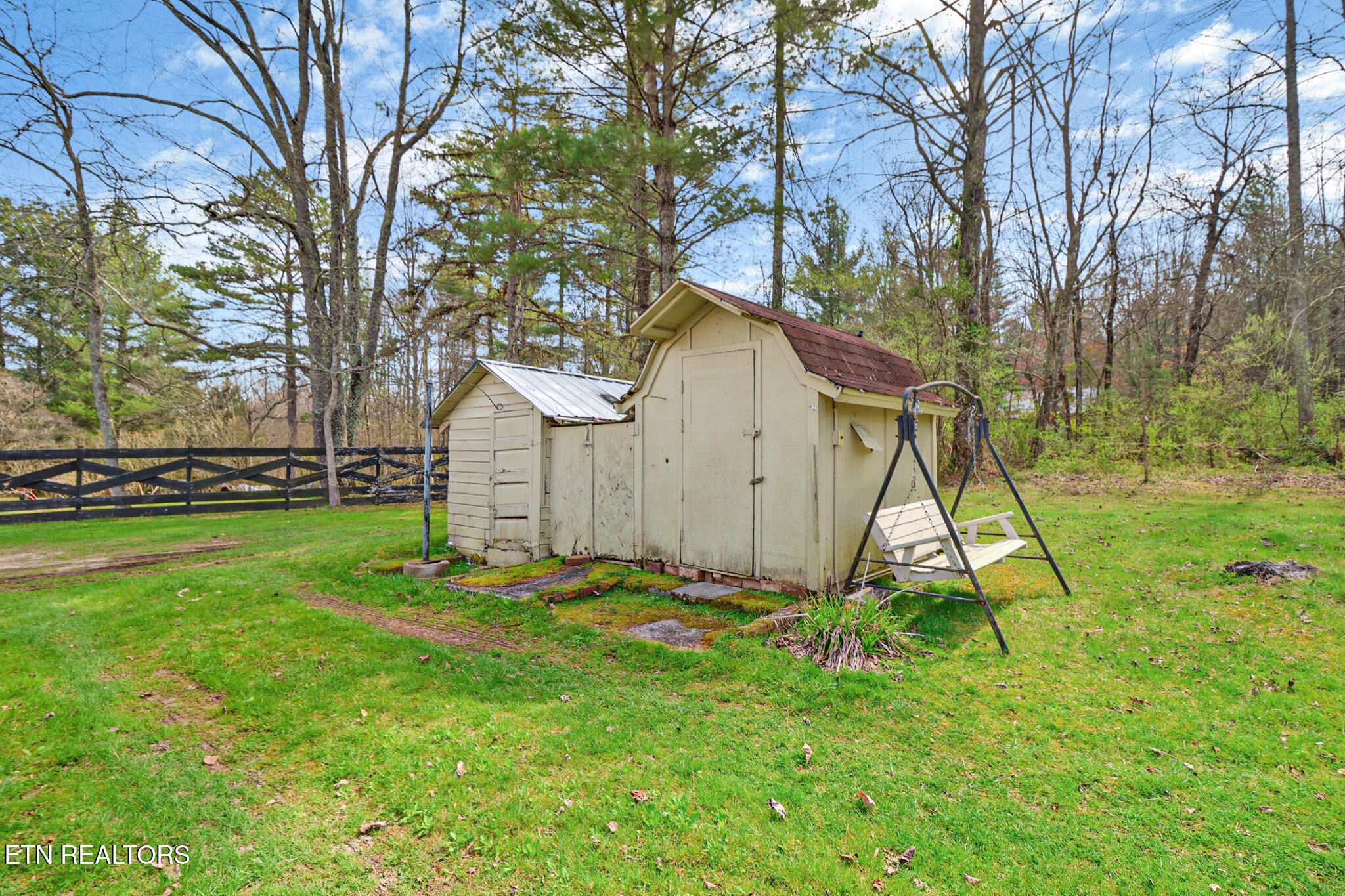 239 Doc Huling Road Robbins, TN 37852 - Photo 6 of 55 a view of a backyard with a table and chair
