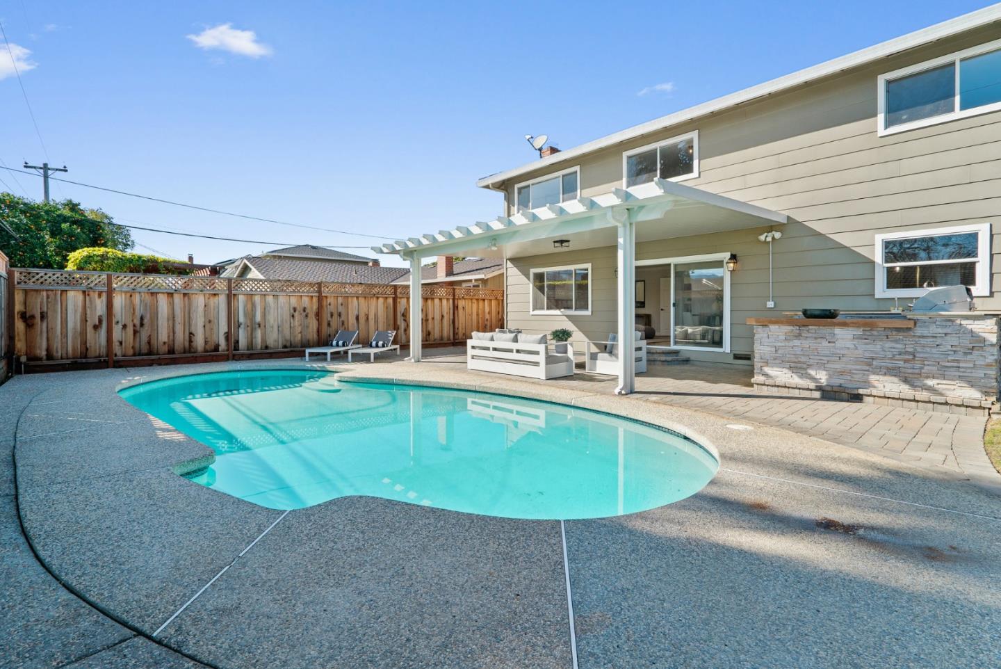 1762 El Codo Way San Jose, CA 95124 - Photo 50 of 81 a swimming pool with outdoor seating yard and slide