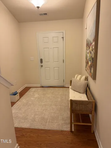 a bedroom with a bed and furniture