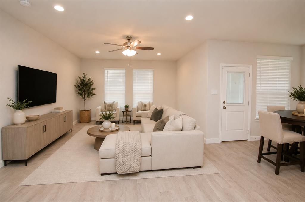 1804 Mensa Drive Haslet, TX 76052 - Photo 9 of 30 Spacious open-concept living area featuring light wood-finish flooring, recessed lighting, and a ceiling fan