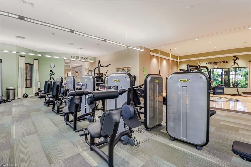 9366 Pocida Court, Unit 202 Naples, FL 34119 - Photo 41 of 44 a view of a room with gym equipment