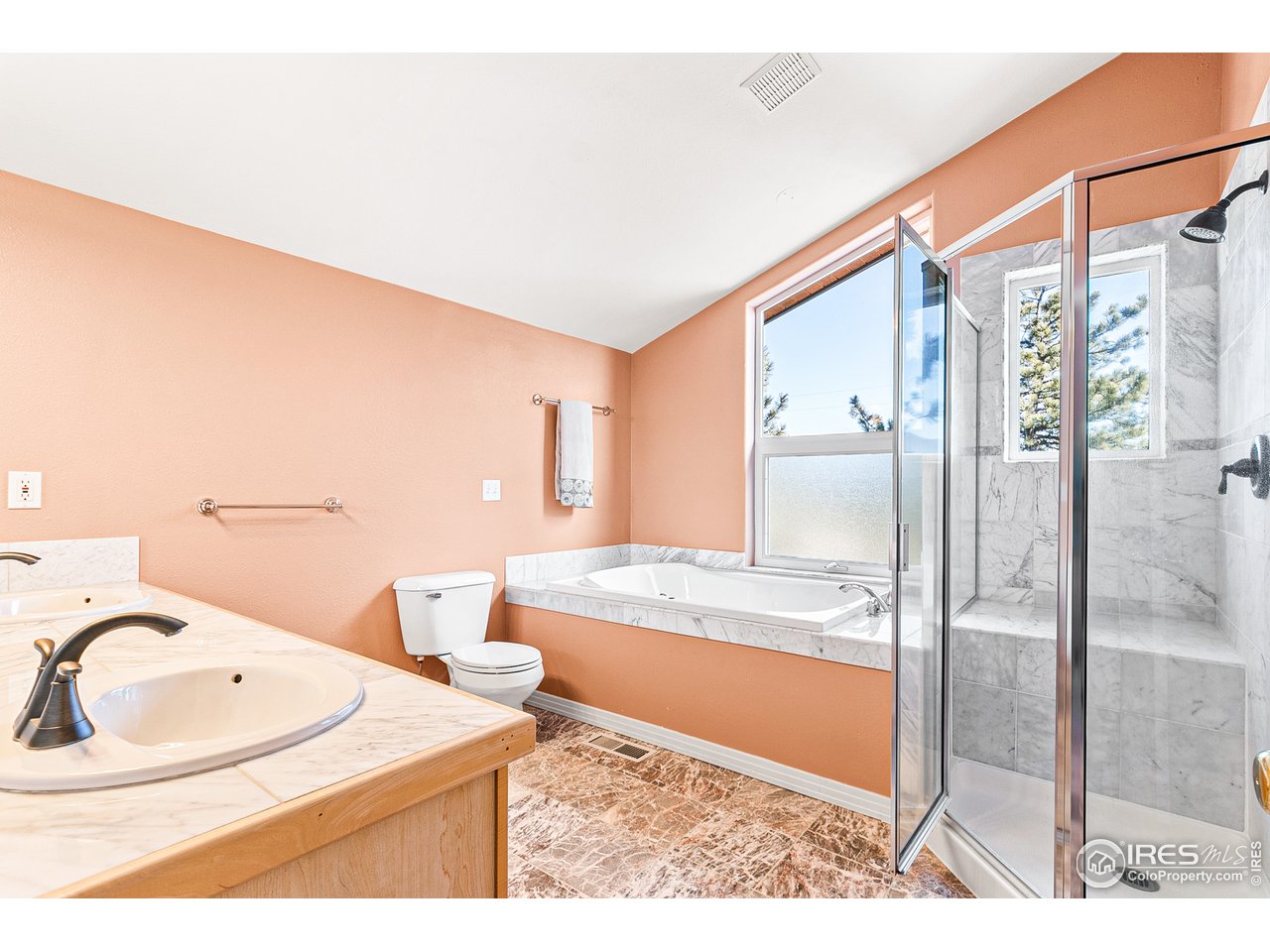 239 Broken Fence Road Boulder, CO 80302 - Photo 17 of 40 a bathroom with a sink and a mirror