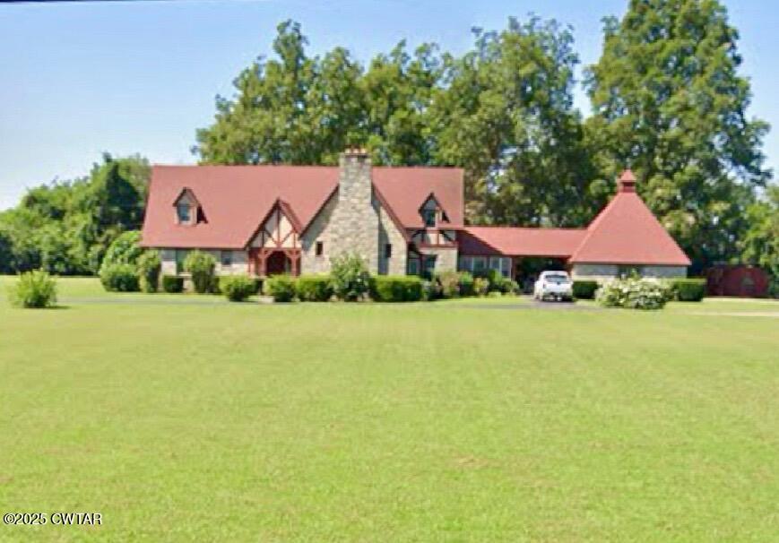 641 Headden Drive Ridgely, TN 38080 - Photo 21 of 21 a view of an house with backyard space and garden