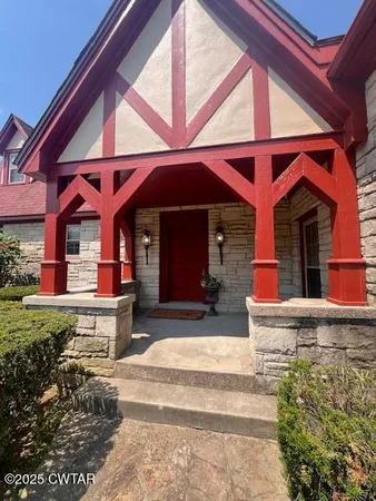 a front view of a house with a porch