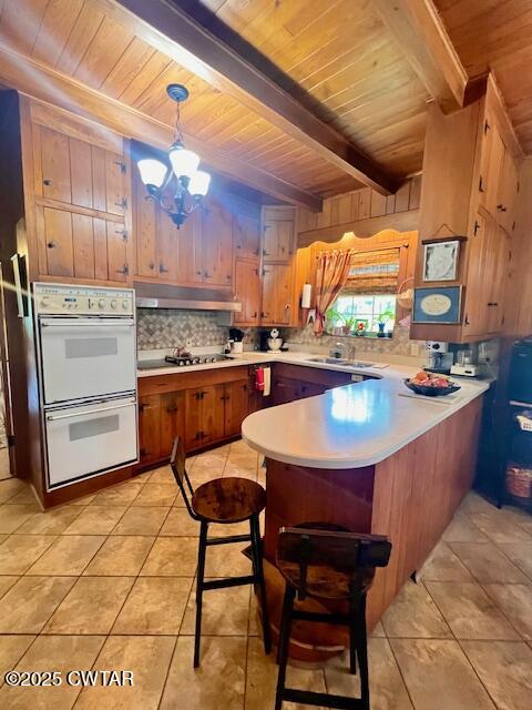 641 Headden Drive Ridgely, TN 38080 - Photo 9 of 21 a kitchen with stainless steel appliances granite countertop a sink and cabinets