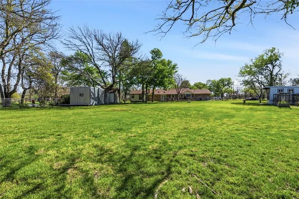 a house view with a garden space