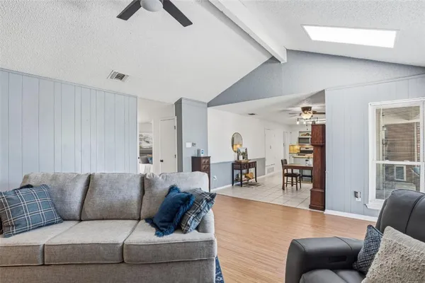 a living room with furniture and a couch