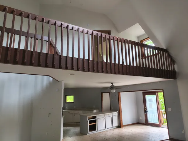a bathroom with a sink toilet and mirror