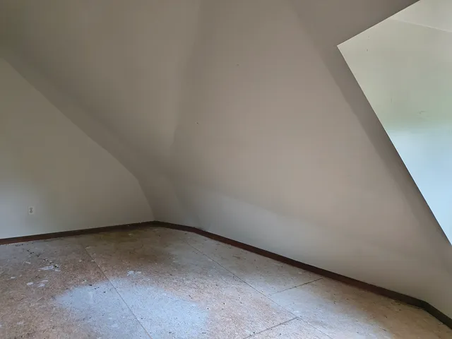 a view of a room with an empty space