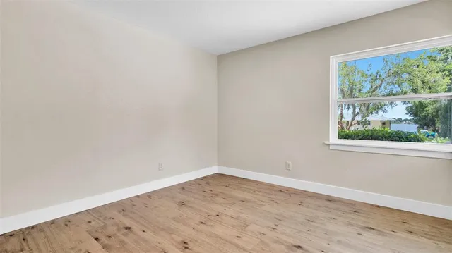 a bathroom with a sink a mirror and a toilet