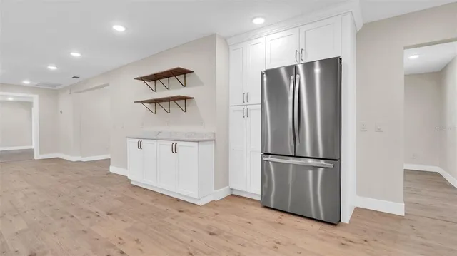 an aerial view of a house with a garden