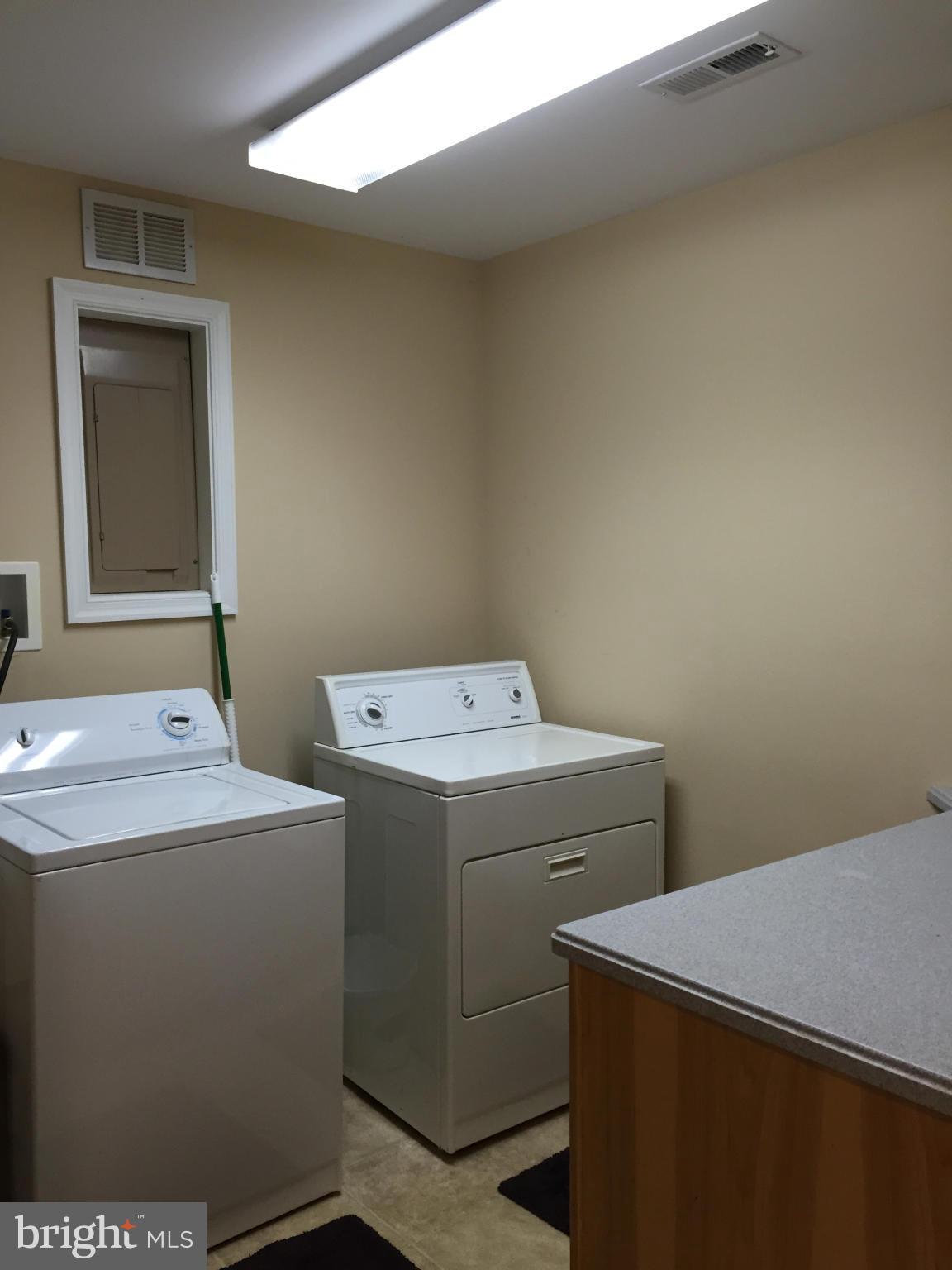 3049 Tudor Hall Road Riva, MD 21140 - Photo 24 of 30 a utility room with dryer and washer