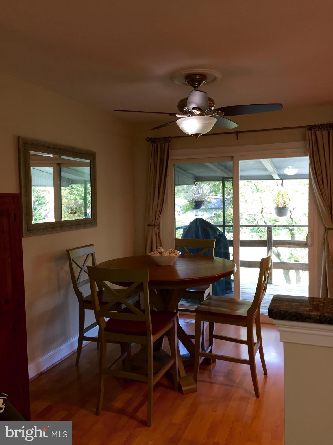 3049 Tudor Hall Road Riva, MD 21140 - Photo 6 of 30 a view of a dining room with furniture window and outside view