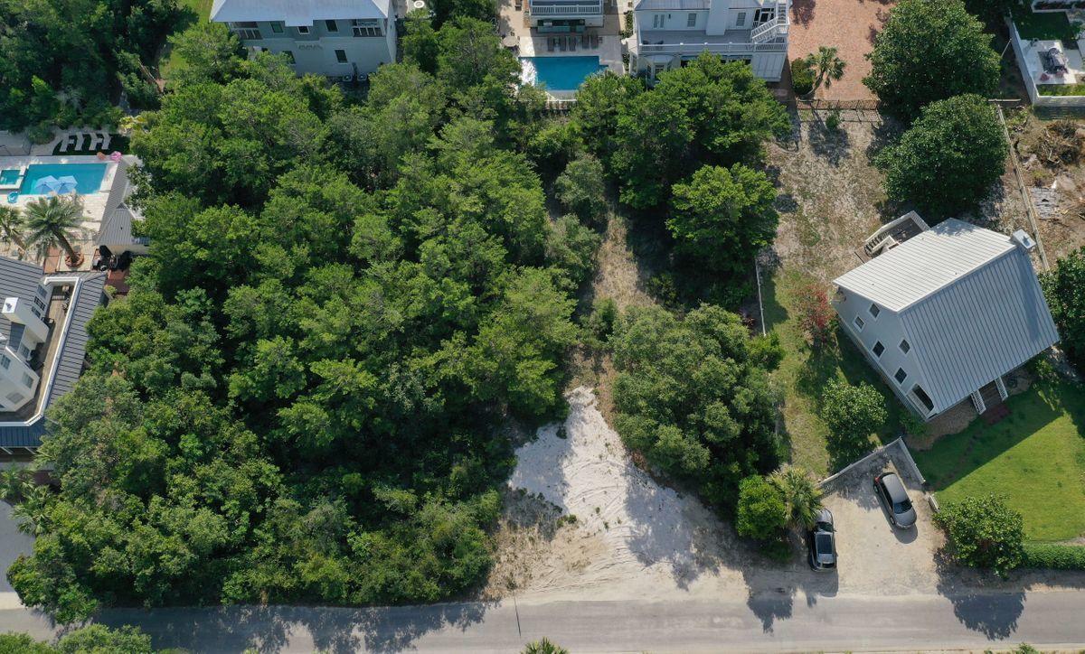 Lot 83 Winston Ln Inlet Beach Inlet Beach, FL 32461 - Photo 8 of 11 an aerial view of a house with a yard and outdoor seating