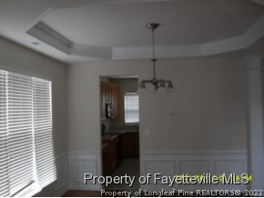 5412 Shaker Heights Lane Raleigh, NC 27613 - Photo 6 of 15 a view of a hallway with a window