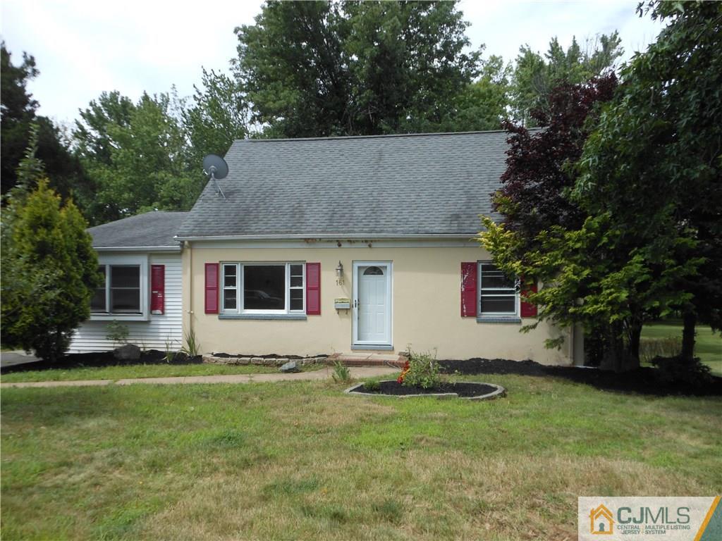 161 Jordan Road Colonia, NJ 07067 - Photo 1 of 15 a front view of house with yard