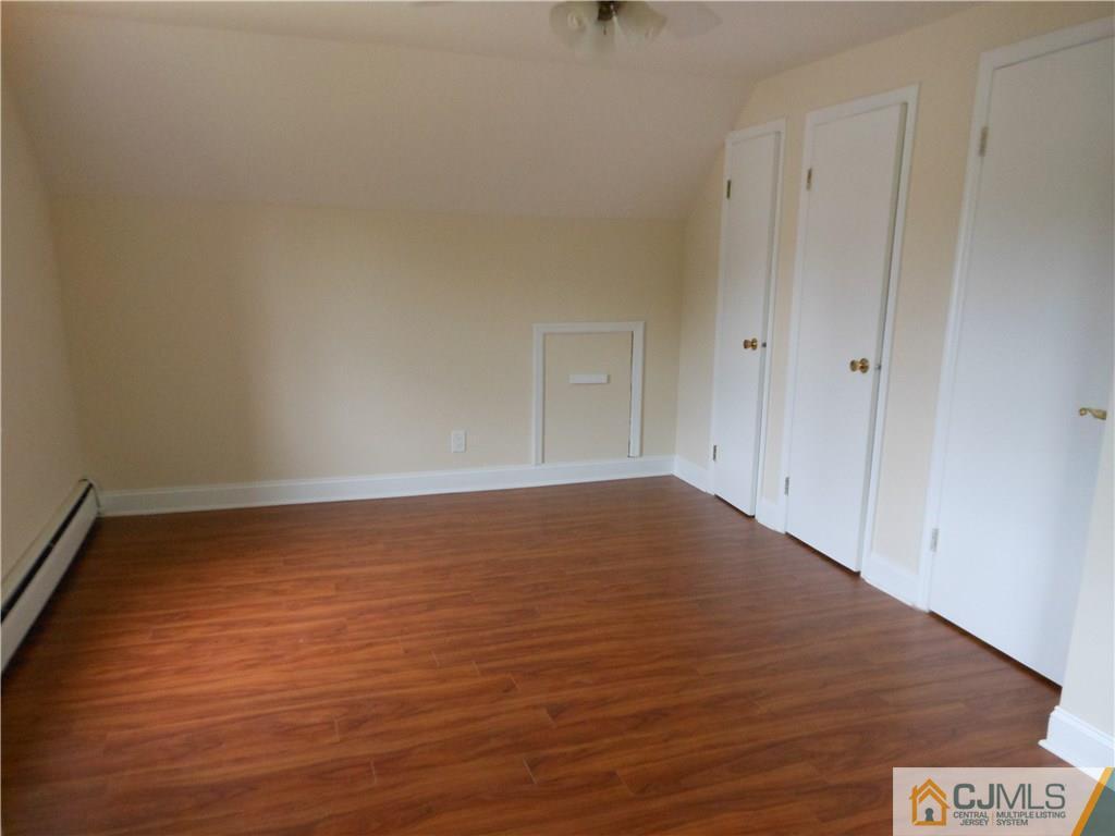 161 Jordan Road Colonia, NJ 07067 - Photo 13 of 15 a view of empty room with wooden floor