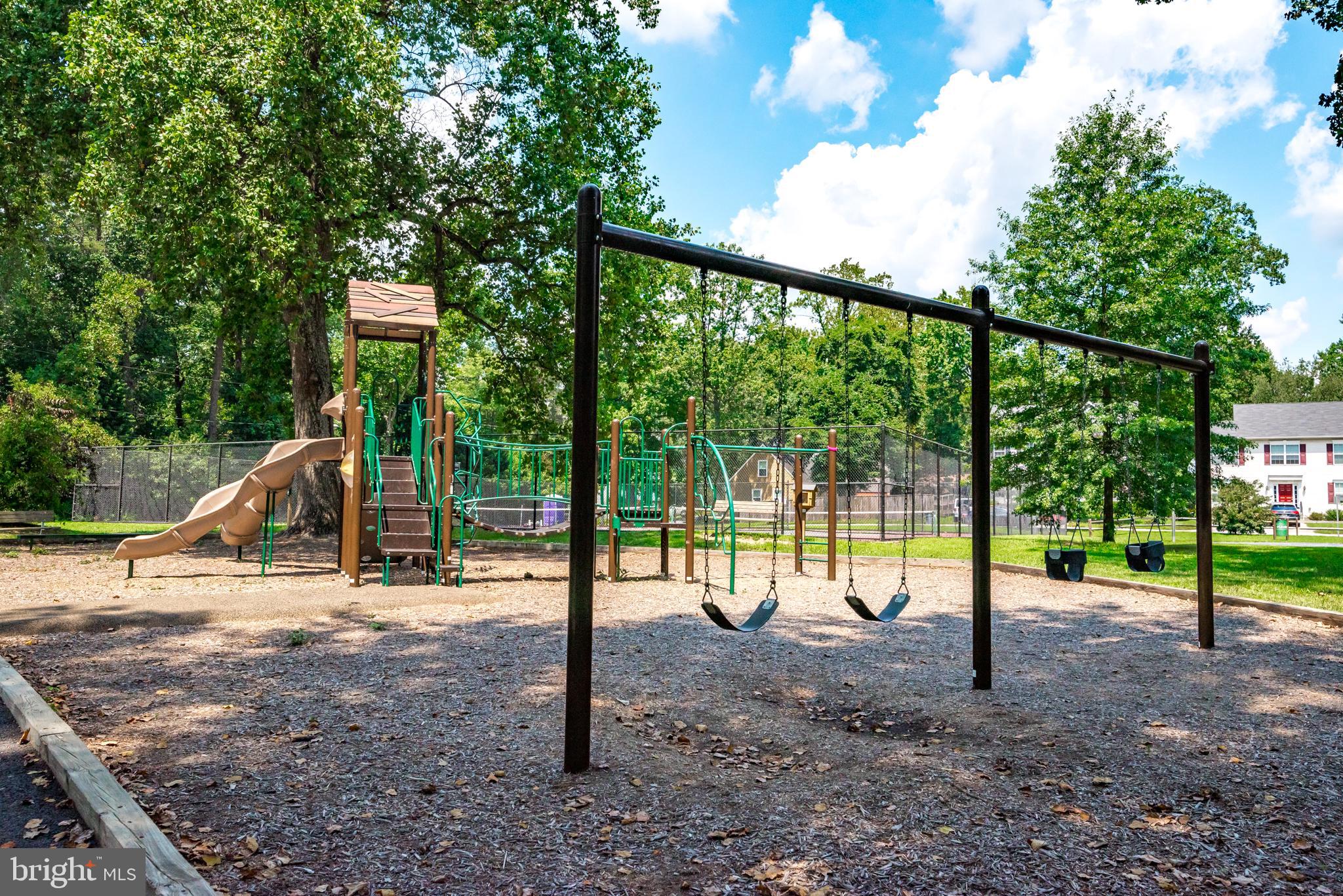 902 Hine Trail Crownsville, MD 21032 - Photo 18 of 28 a view of trees and playing ground