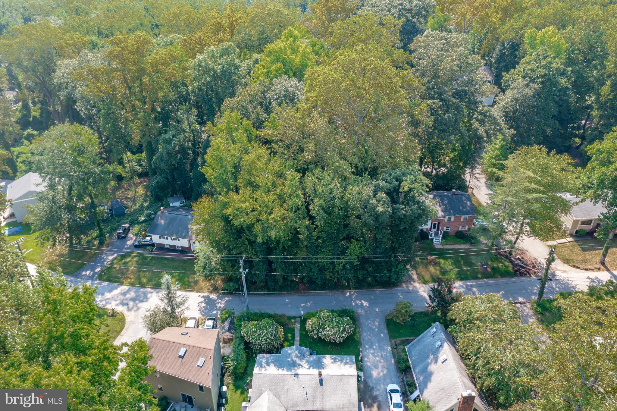 902 Hine Trail Crownsville, MD 21032 - Photo 27 of 28 an aerial view of a house with a yard basket ball court and outdoor seating