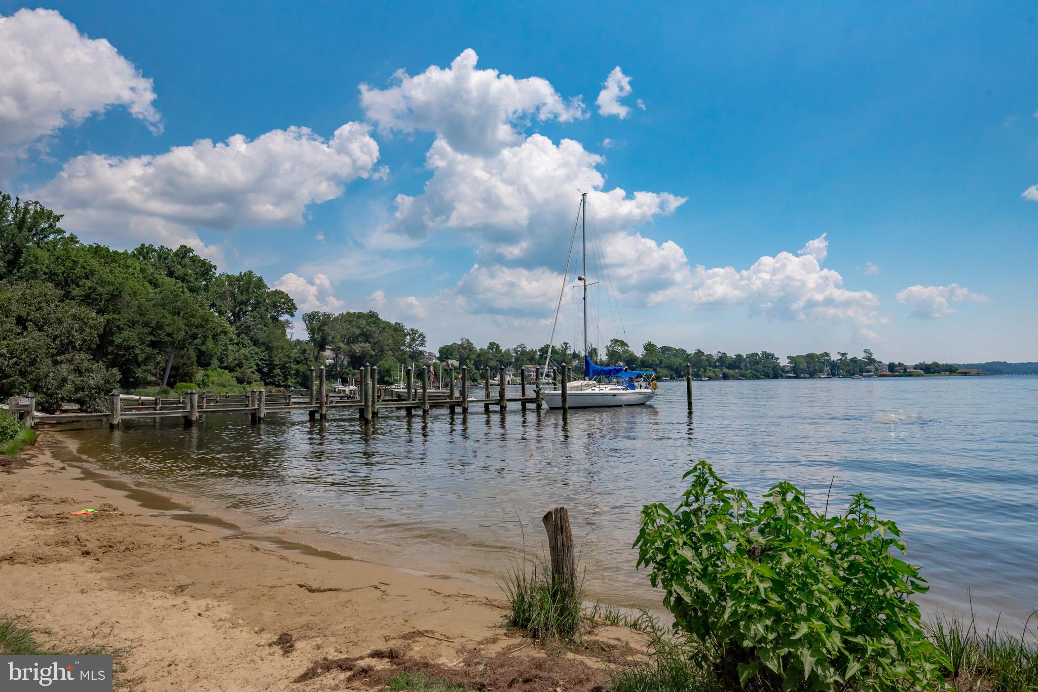902 Hine Trail Crownsville, MD 21032 - Photo 10 of 28 a view of a lake with houses in the background
