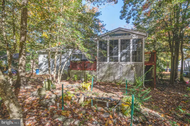 a view of a room with large windows