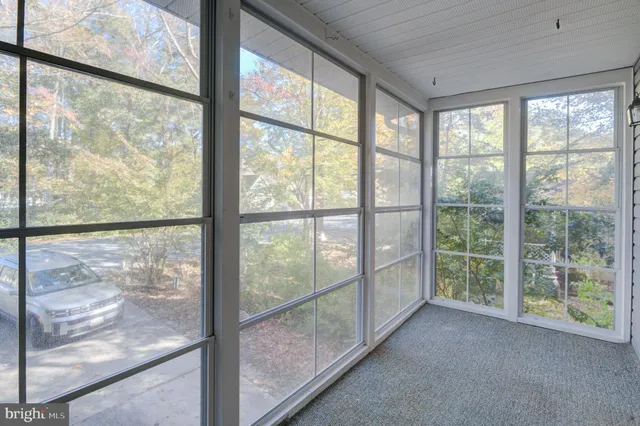 a big room with windows and closet