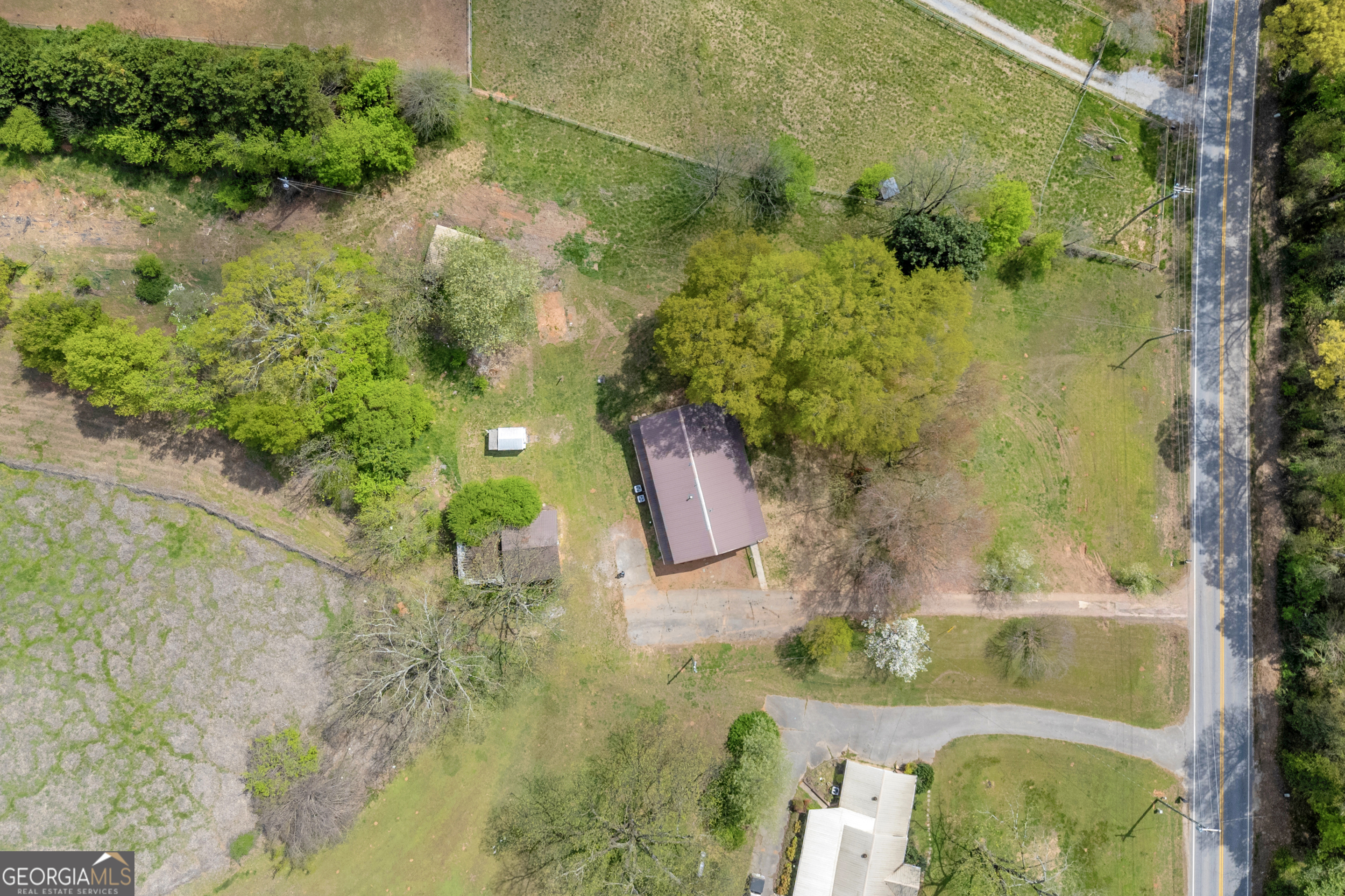 8606 Holly Springs Road Maysville, GA 30558 - Photo 68 of 74 a view of a garden