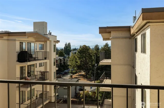 a view of a brick house with a large window