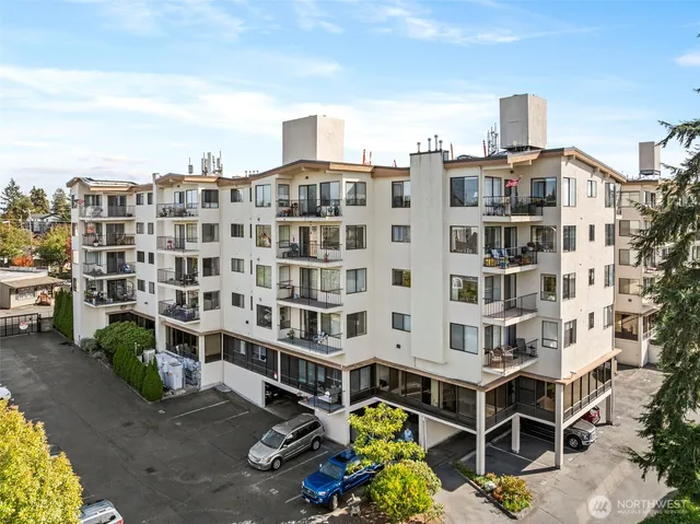 a front view of a building with glass windows