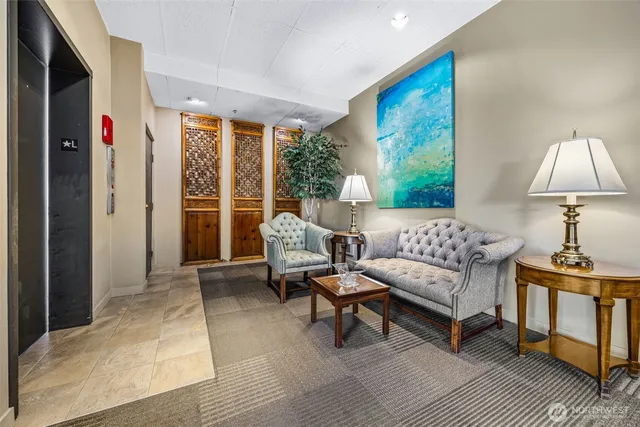 a living room with furniture and a window