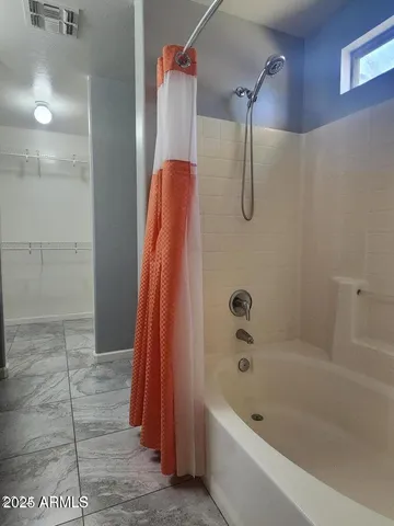 a bathroom with a tub