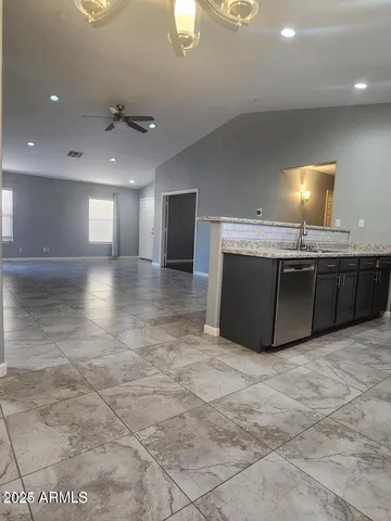 a view of a kitchen with a sink