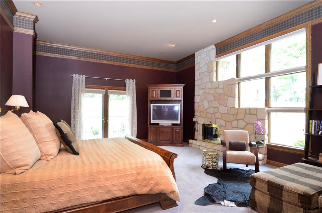 181 Merriman Road Sewickley Heights, PA 15143 - Photo 17 of 25 Exquisite master bedroom with sitting area and doors to patio with views of lawn and gardens.
