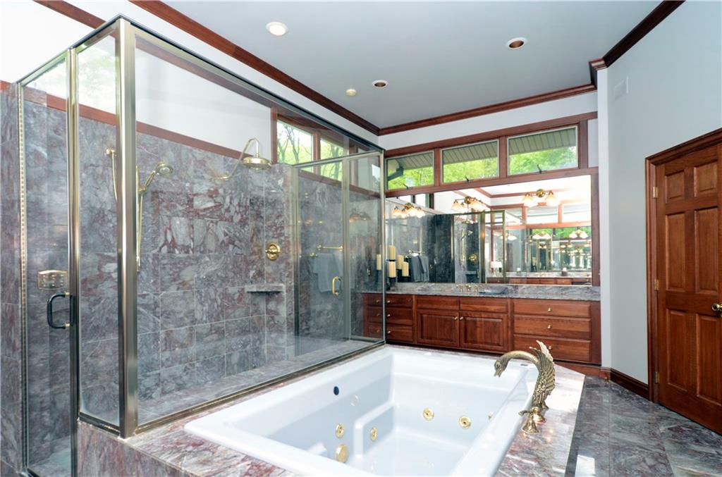 181 Merriman Road Sewickley Heights, PA 15143 - Photo 18 of 25 Luxurious master bath, shower with glass and marble surround, cherry cabinetry and marble flooring & countertops.