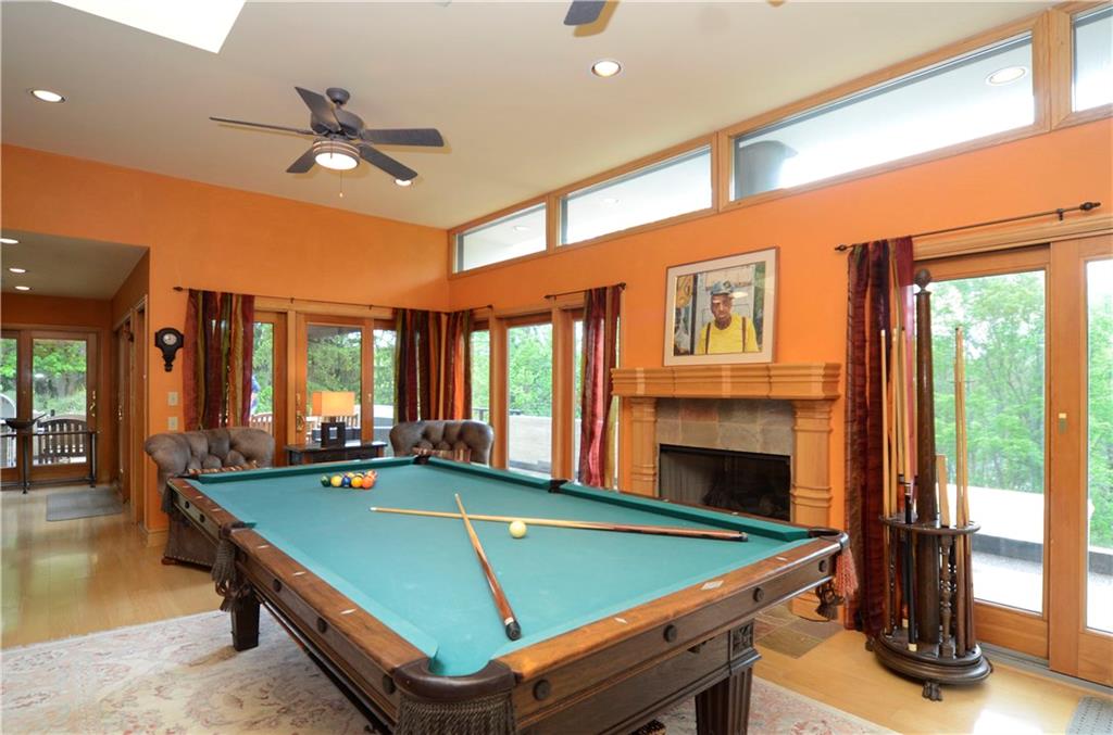 181 Merriman Road Sewickley Heights, PA 15143 - Photo 19 of 25 Handsome billiard room with fireplace, access to elaborate decking and family room.