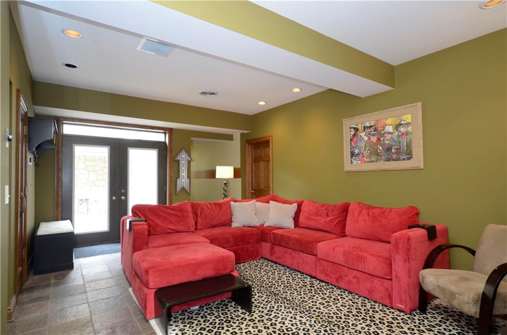 181 Merriman Road Sewickley Heights, PA 15143 - Photo 20 of 25 Fantastic lower level game room with steam shower, sauna, access to patio, exercise room, kitchen and wine cellar.