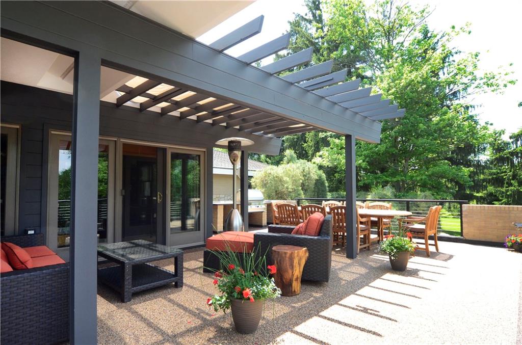 181 Merriman Road Sewickley Heights, PA 15143 - Photo 22 of 25 Expansive decking, seating areas, built-in grill and access to kitchen and billiard room.