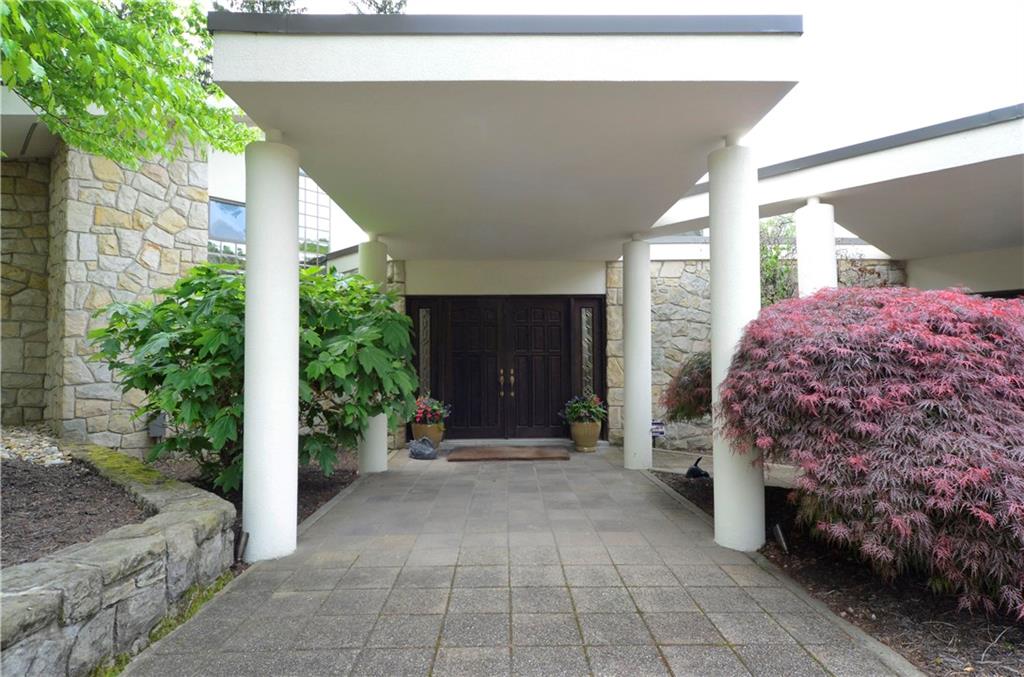 181 Merriman Road Sewickley Heights, PA 15143 - Photo 4 of 25 Grand entry features double oak doors and beautiful landscaping.