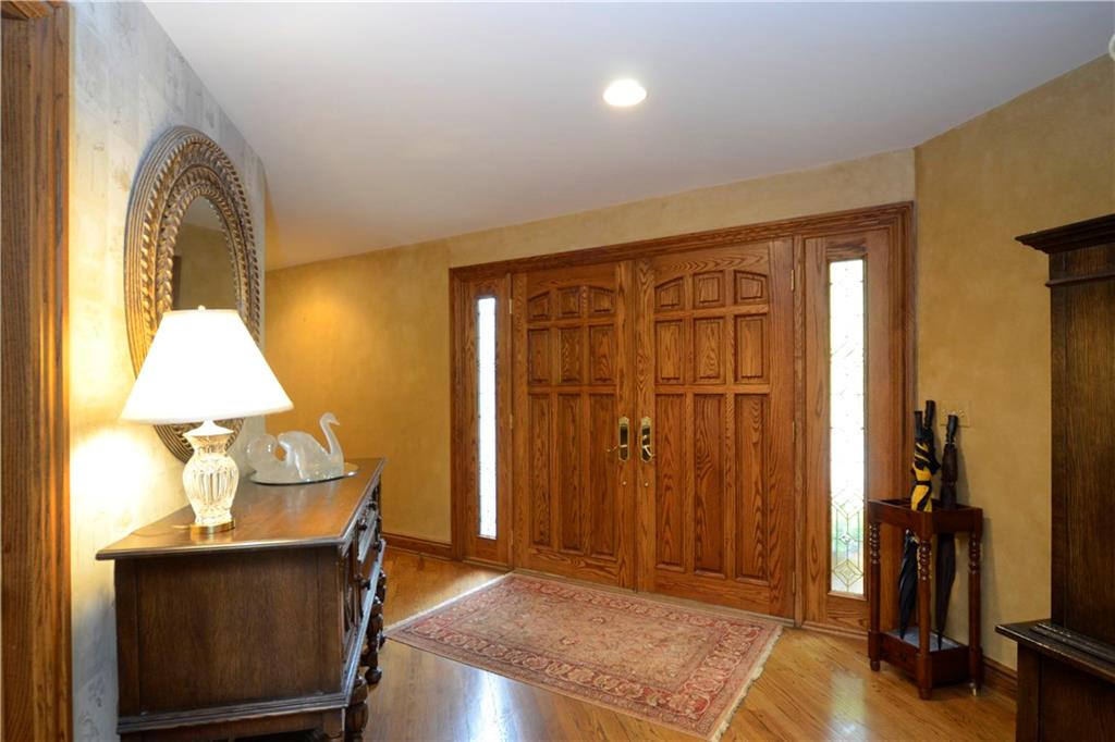 181 Merriman Road Sewickley Heights, PA 15143 - Photo 5 of 25 Formal entry includes a vaulted ceiling and hardwood flooring.