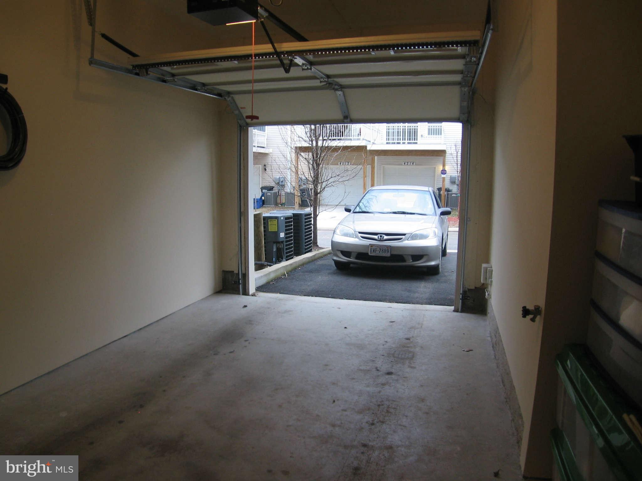 4106 Potomac Highlands Circle, Unit 3 Triangle, VA 22172 - Photo 25 of 27 Garage w/garage door opener