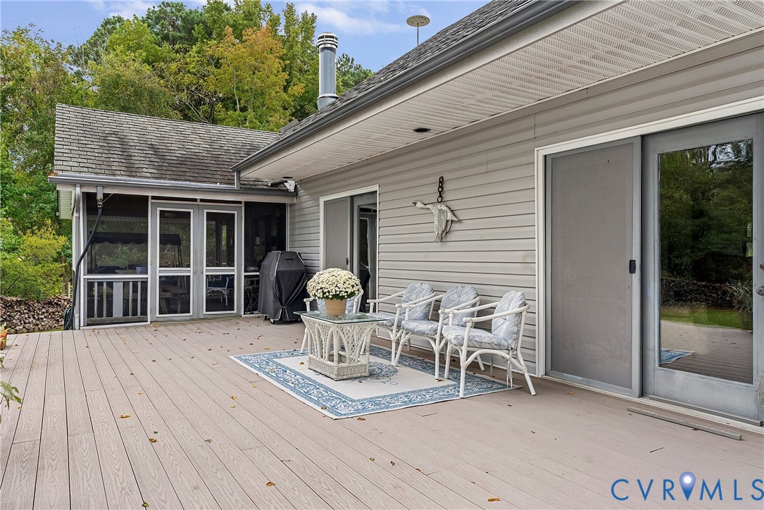 448 McSwain Road White Stone, VA 22578 - Photo 13 of 50 Wooden terrace featuring a sunroom and a grill