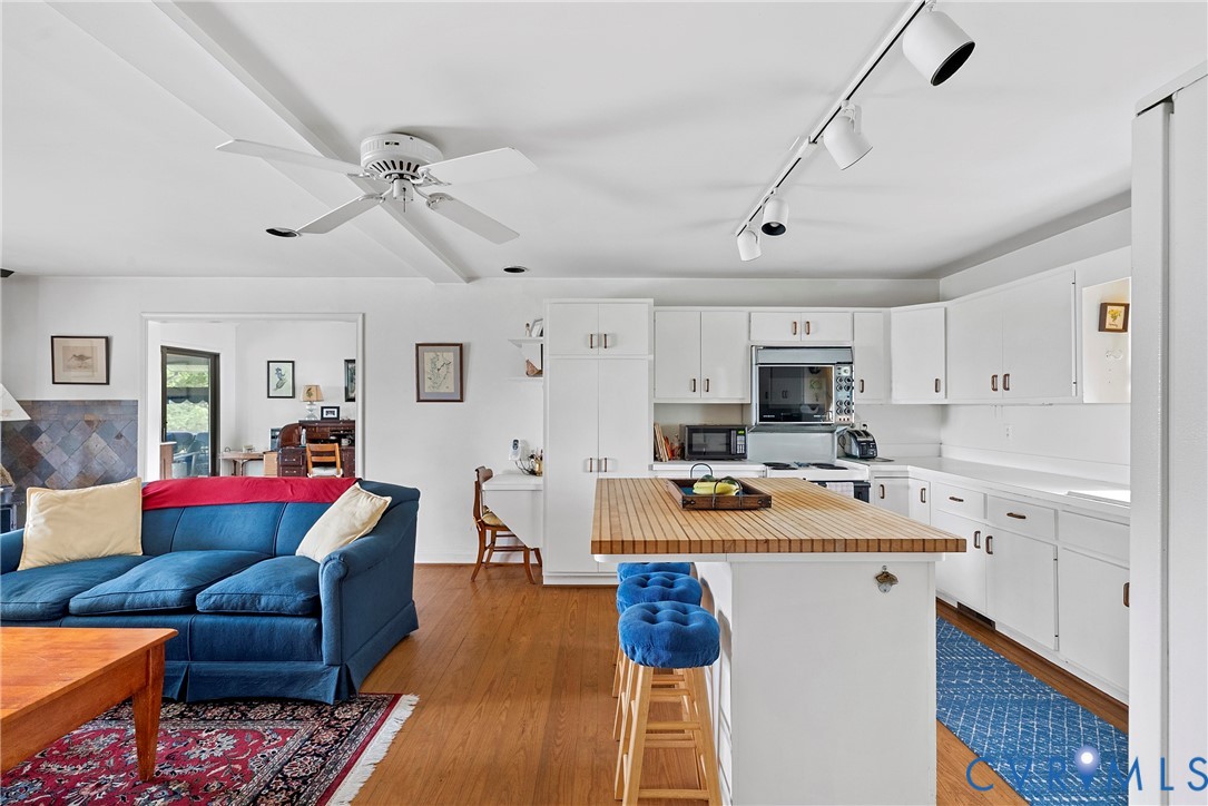 448 McSwain Road White Stone, VA 22578 - Photo 25 of 50 Kitchen with track lighting, a breakfast bar area,