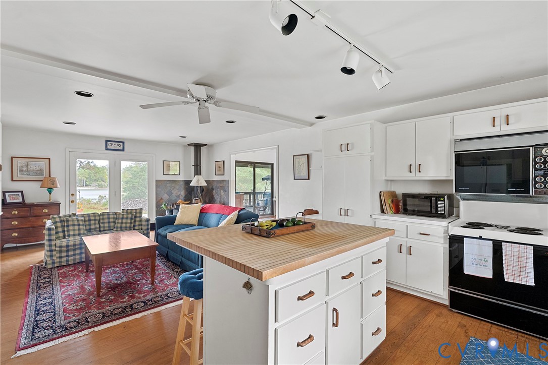 448 McSwain Road White Stone, VA 22578 - Photo 29 of 50 Kitchen with range with electric cooktop, light co