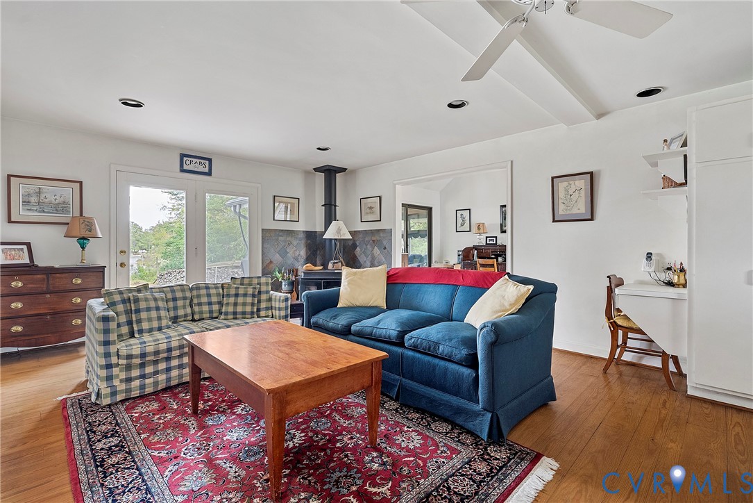448 McSwain Road White Stone, VA 22578 - Photo 30 of 50 Living area featuring a wood stove, wood finished