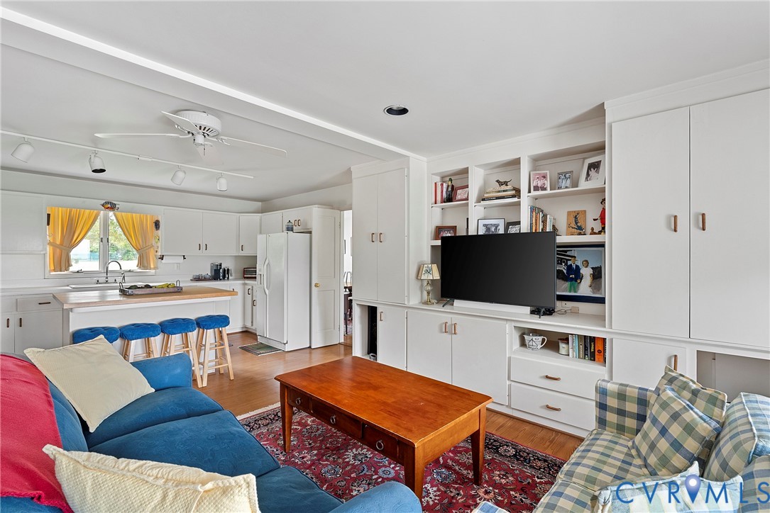 448 McSwain Road White Stone, VA 22578 - Photo 32 of 50 Living area featuring wood finished floors and cei